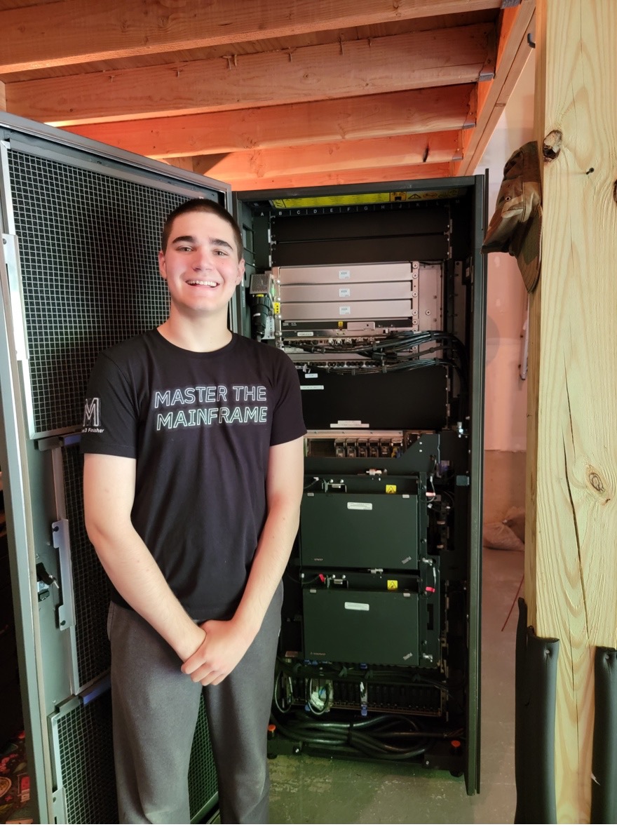 Enzo Damato and the z114 mainframe in his garage